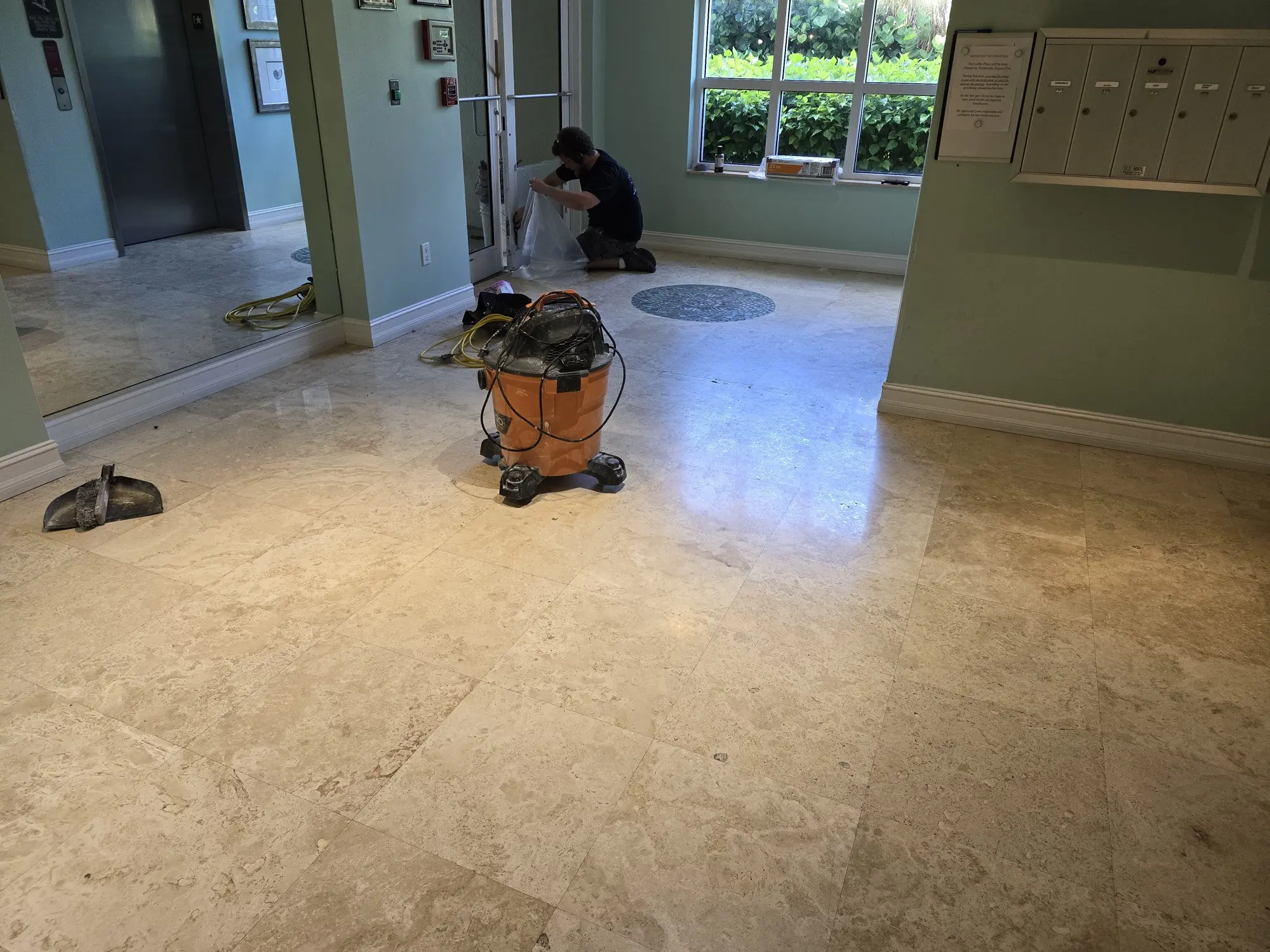 Treasure Coast home marble floors dull and stained before cleaning