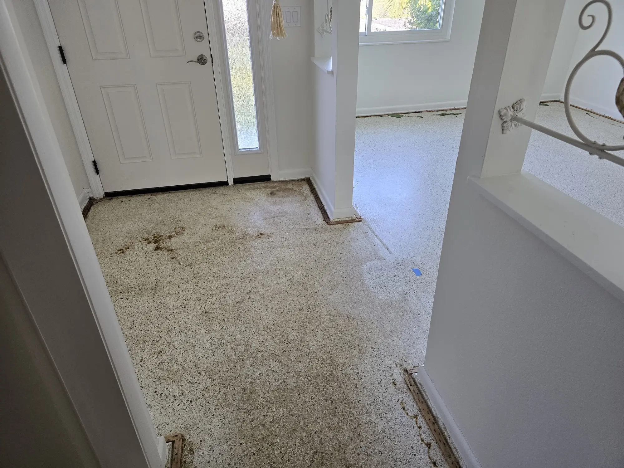 Stained terrazzo floors before Classic Terrazzo and Marble services